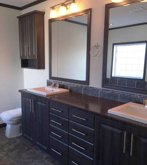 His & Her Sinks with Accent Tile and Framed Mirror